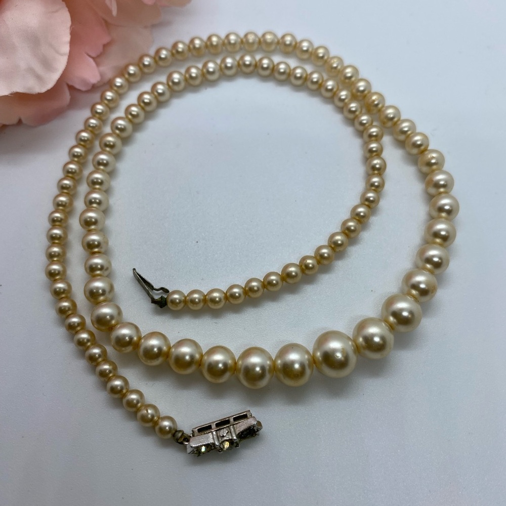 Vintage Richelieu Stamped Pearl 19” Necklace w Bow Clasp
